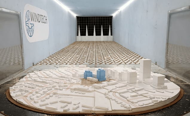 The 3D surround model of the site in the wind tunnel looking north, with the proposed development constructed with blue foam.